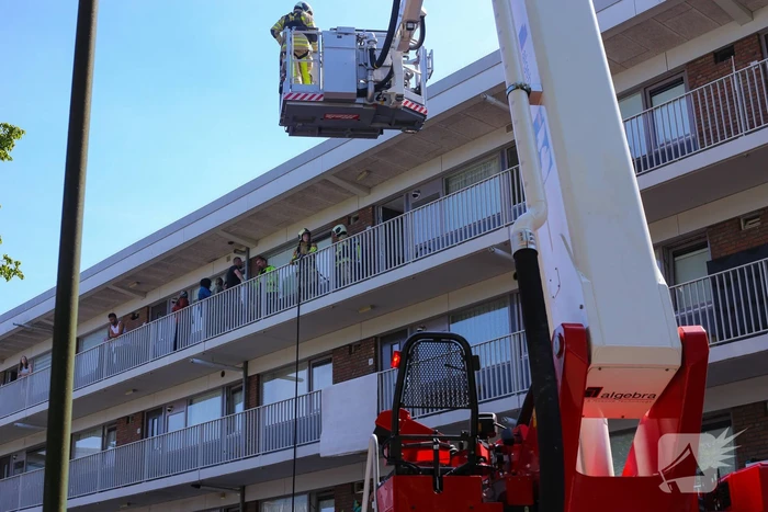 Brand op derde verdieping in flatwoning