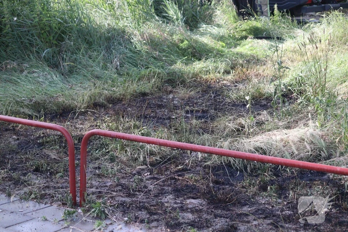 Brandweer blust bermbrand