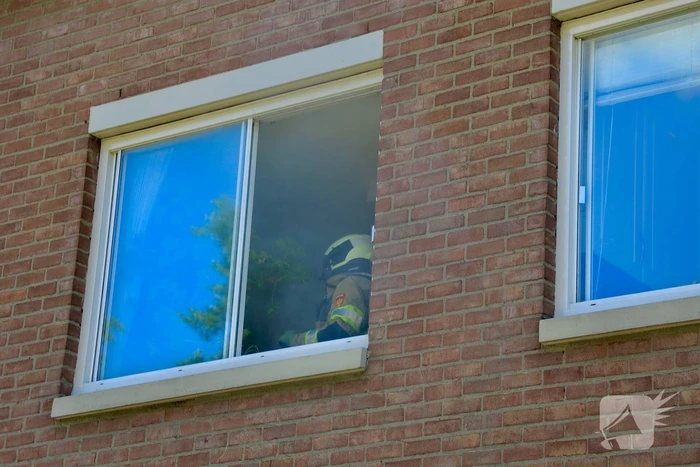 Deur woning opengeramd bij brand in woning