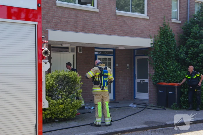 Deur woning opengeramd bij brand in woning