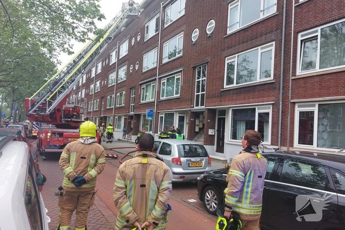 Brand in portiekwoning