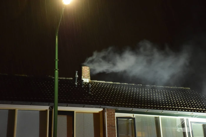 Forse vlammen bij schoorsteenbrand