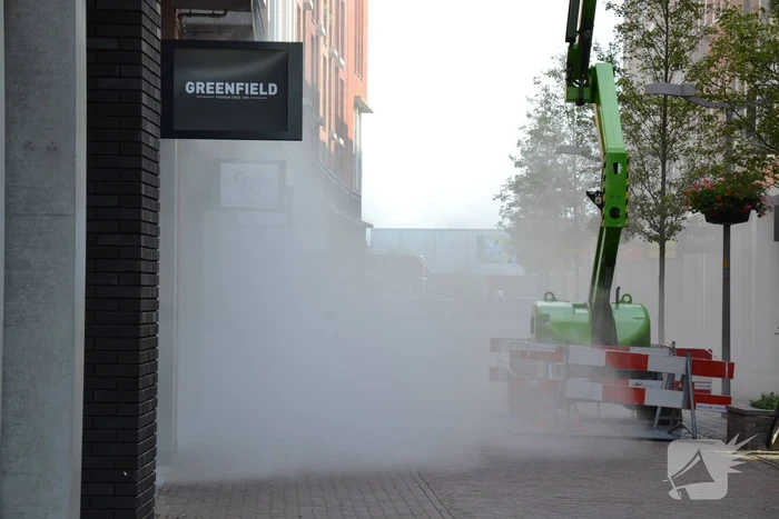 Winkel vol rook door mistgenerator