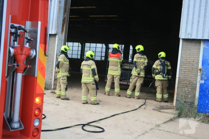 Zaagsel in brand in leegstaande loods