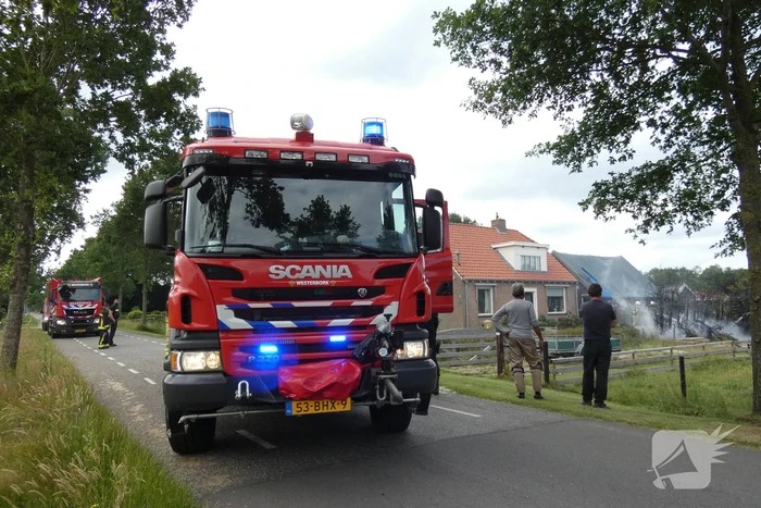 Stuk struiken gaan in vlammen op