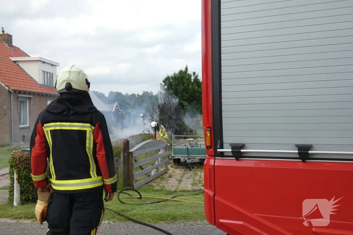 Stuk struiken gaan in vlammen op