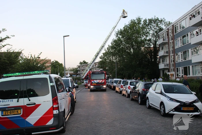 Flat deels ontruimd door brandlucht