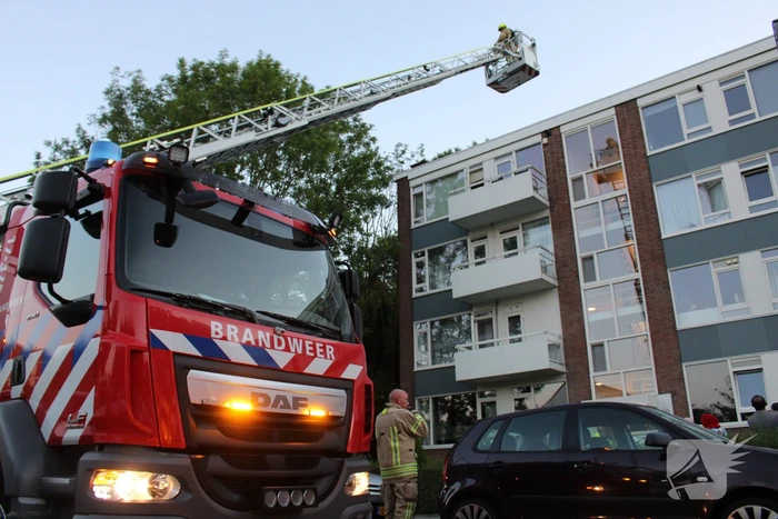 Flat deels ontruimd door brandlucht