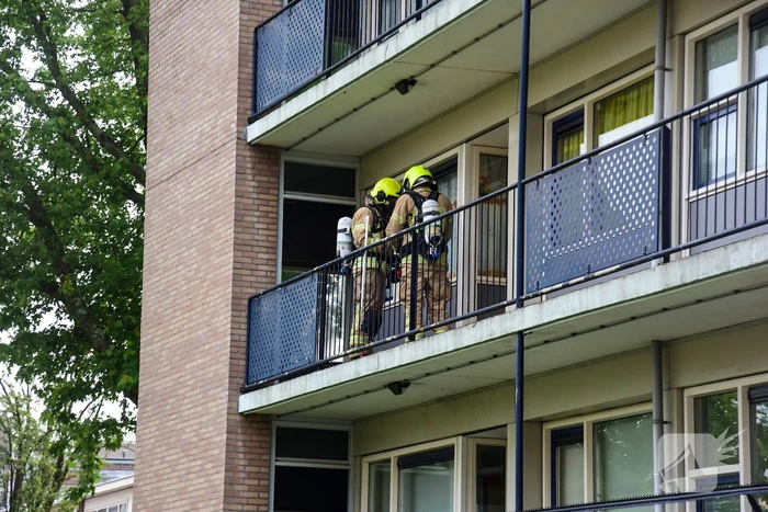Bank in kelderruimte in brand gevlogen