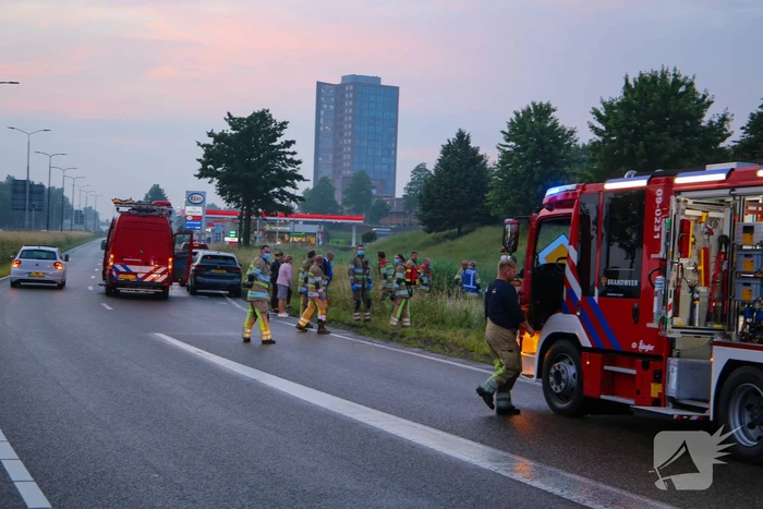 Persoon gered uit te water geraakte auto