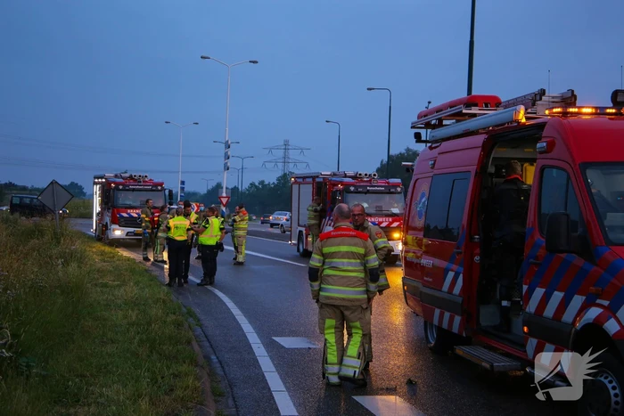 Persoon gered uit te water geraakte auto