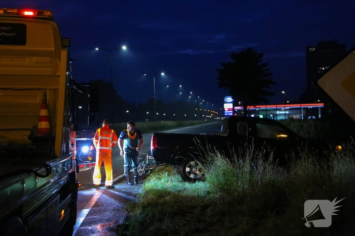 Persoon gered uit te water geraakte auto