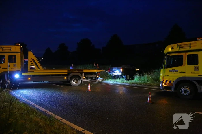Persoon gered uit te water geraakte auto