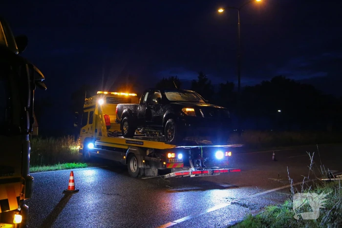 Persoon gered uit te water geraakte auto