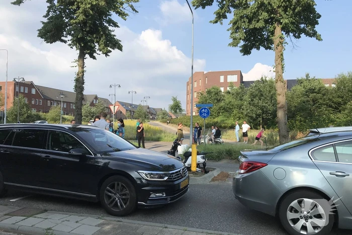 Aanrijding tussen personenauto en scooter