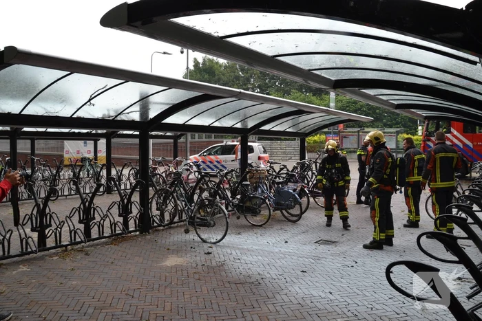 Fiets in brand in fietsenstalling