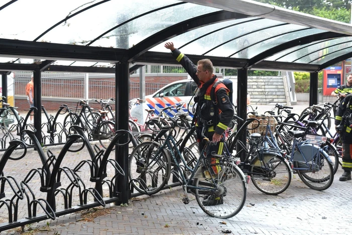 Fiets in brand in fietsenstalling