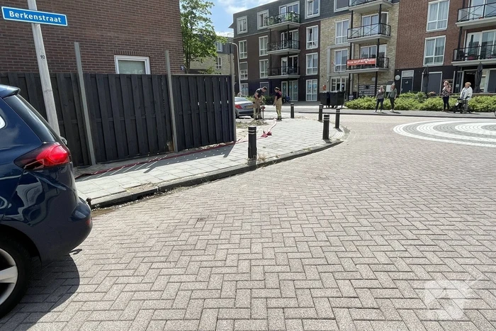 Schutting in achtertuin beschadigd door brand