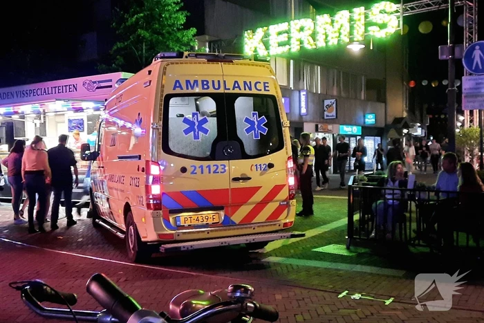 Persoon bewusteloos op kermisterrein