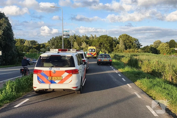 Persoon ten val met scooter