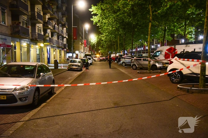 Schoten gelost op woning en winkelpand