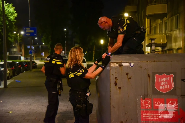 Schoten gelost op woning en winkelpand