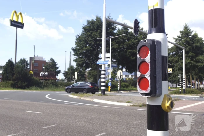 Verkeerslicht lijkt op rood staan door bekladding