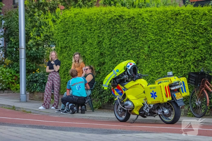 Personenauto's in botsing voor verkeerslicht