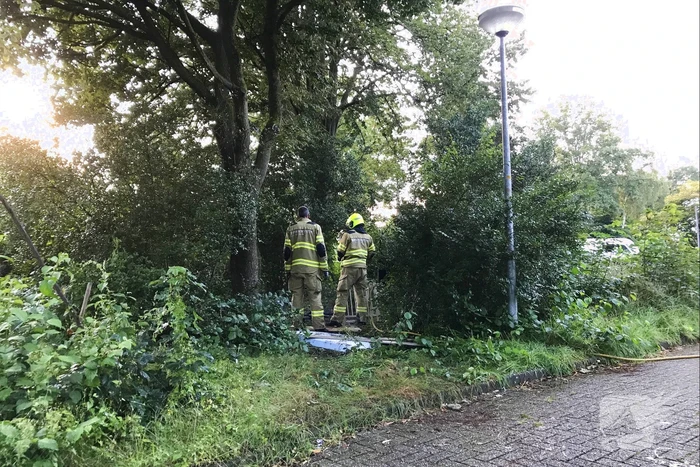 Afval in brand gestoken in bosjes