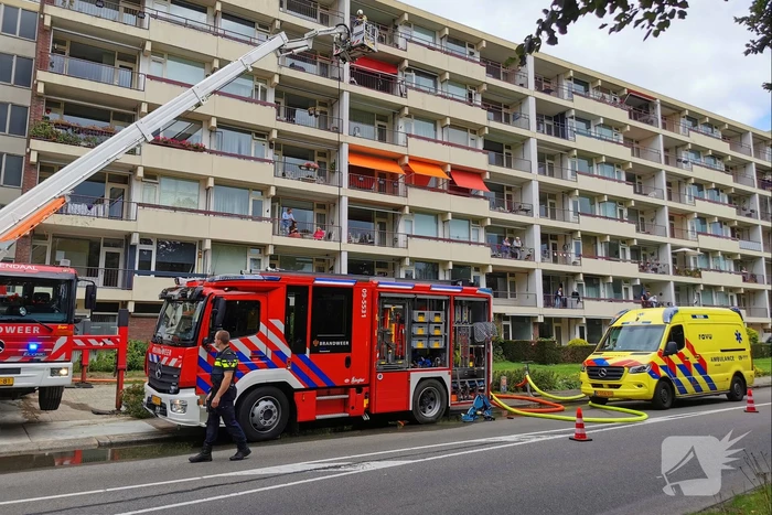 Etage appartementencomplex ontruimd bij brand