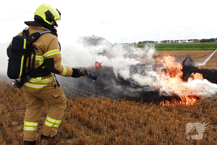 Hooi balenpers vliegt in brand