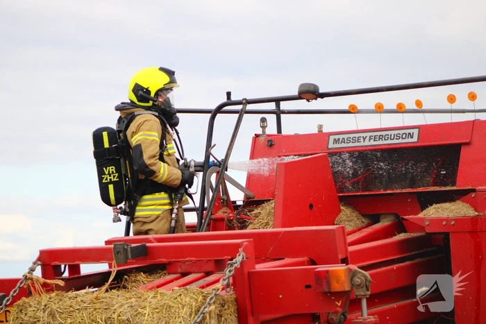 Hooi balenpers vliegt in brand