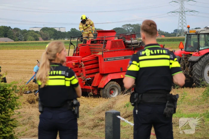 Hooi balenpers vliegt in brand