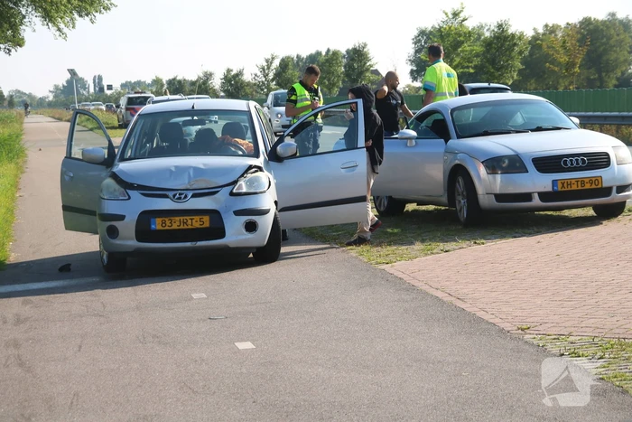 Persoon gewond bij kop-staartbotsing
