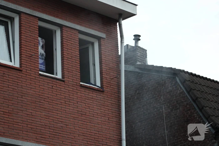 Woning vol rook door brand