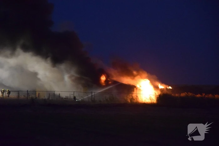 Uitslaande brand in bouwkeet