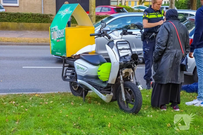 Bestelbus en personenauto met elkaar in botsing tijdens ander ongeval