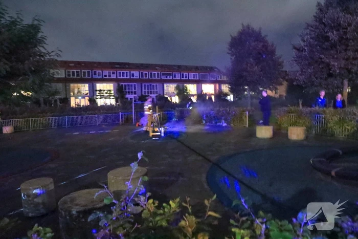Folders in brand op speeltuin
