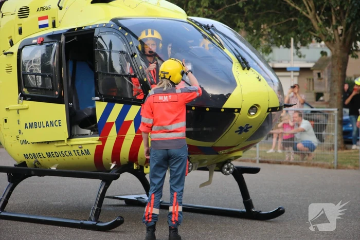 Persoon gewond na val van hoogte