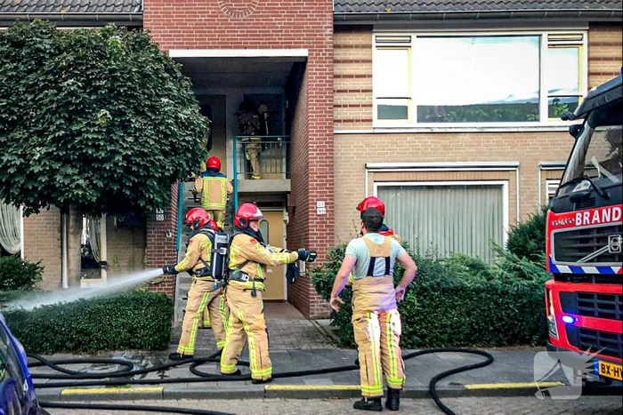 Veel rook bij brand in portiekwoning