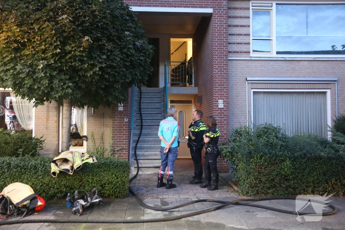 Veel rook bij brand in portiekwoning