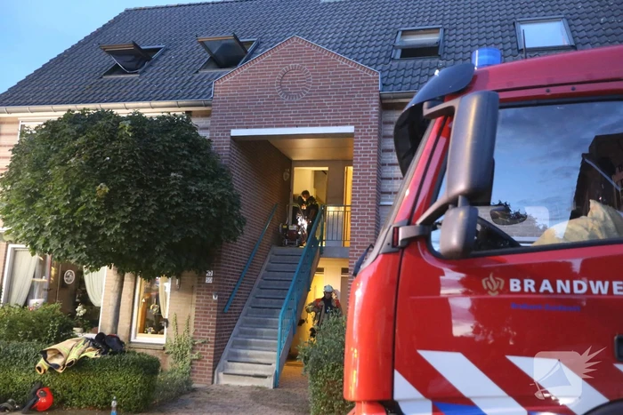 Veel rook bij brand in portiekwoning