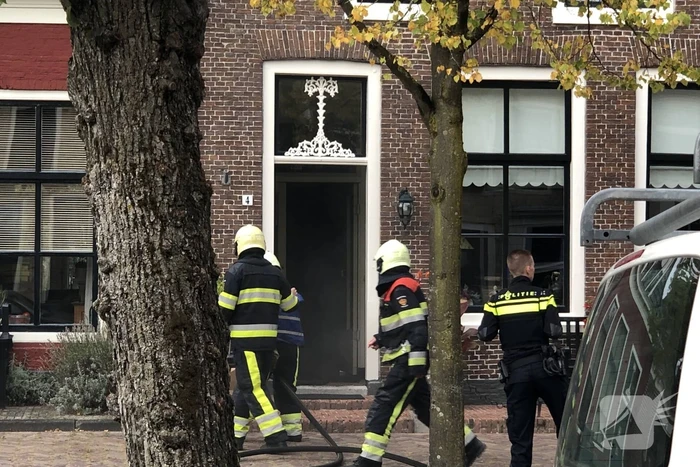 Veel rook bij keukenbrand van woning