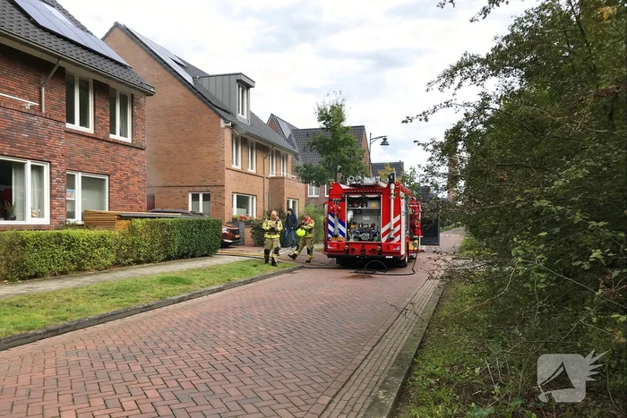 Brand in schuur naast woning