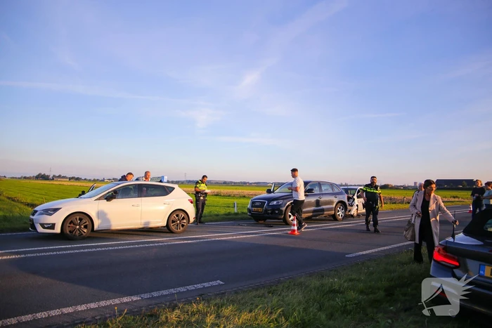 Kop-staartbotsing met lesauto