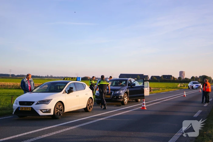 Kop-staartbotsing met lesauto