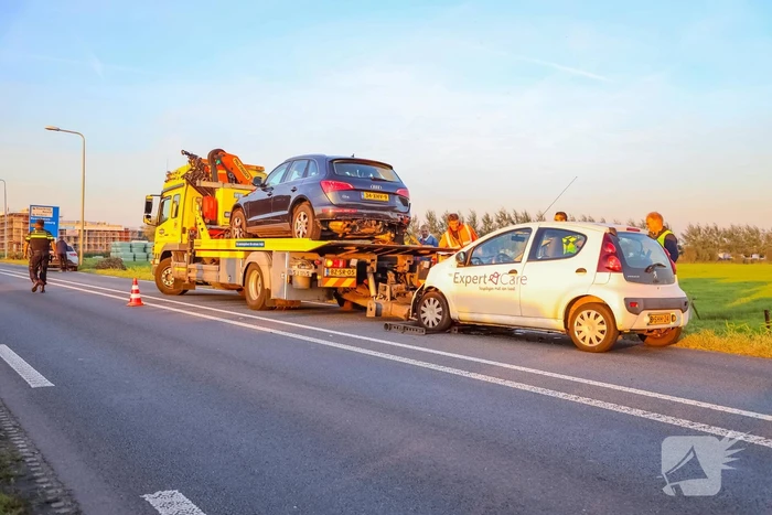 Kop-staartbotsing met lesauto