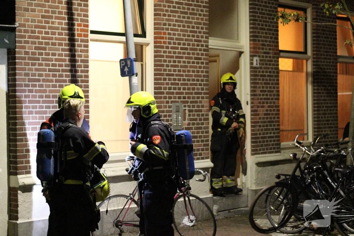 Schilderij vat vlam in woning