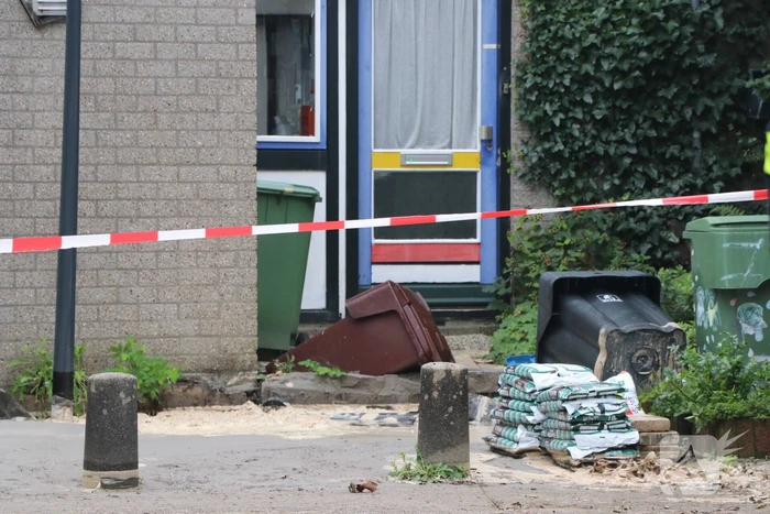 Voorzijde weggezakt bij een woning