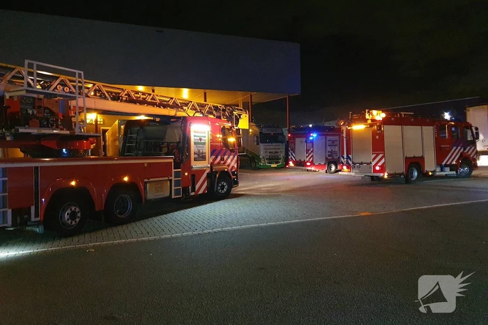 Rookontwikkeling door brand in perscontainer